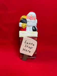 Hand Carved Santa in Chimney